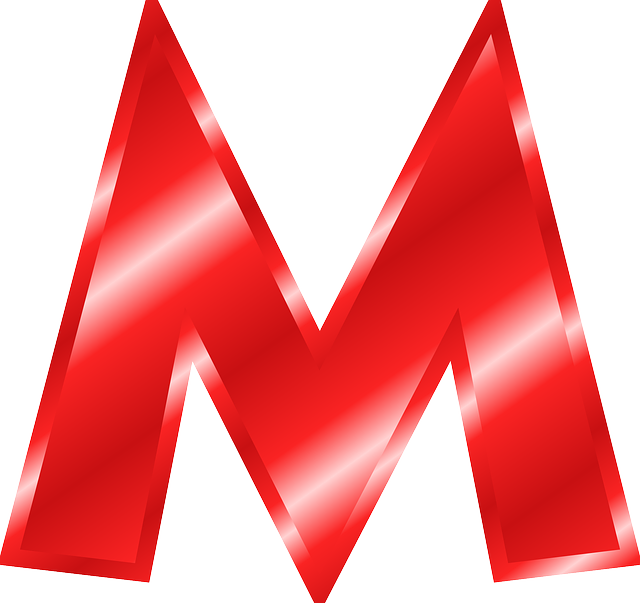 M B